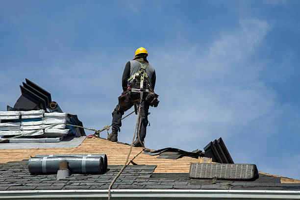 Professional Roofing technician working in Arlington, OR